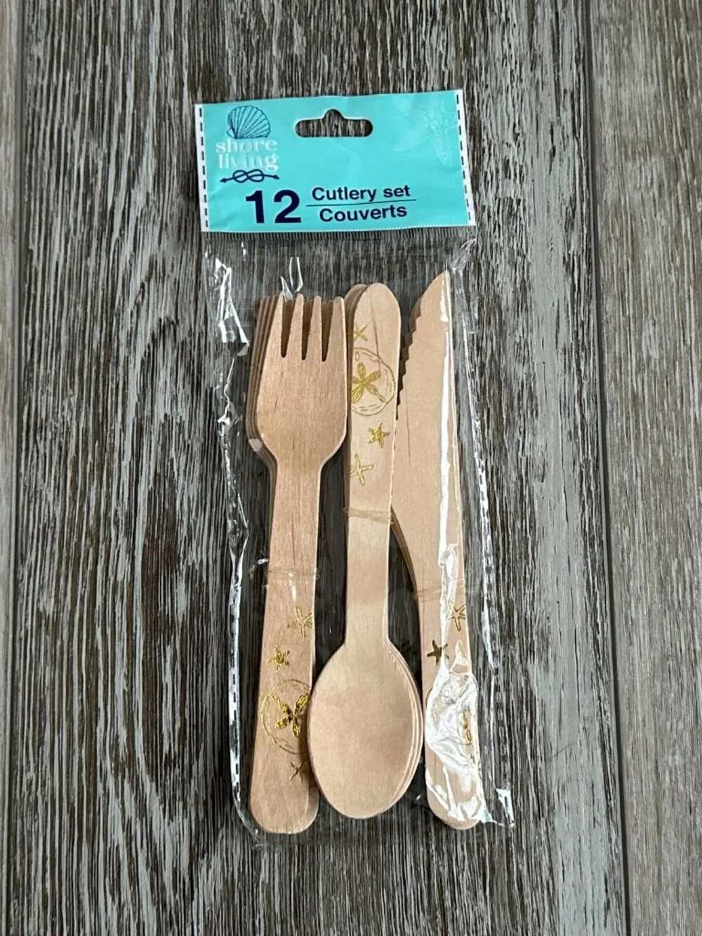 NWT Shore LIving 12 pc Cutlery Set Wood Silverware w Gold Starfish etc Design